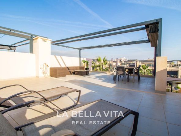 Modern Apartment with solarium for sale step away from the beach in Mil Palmeras, Alicante, Spain solarium