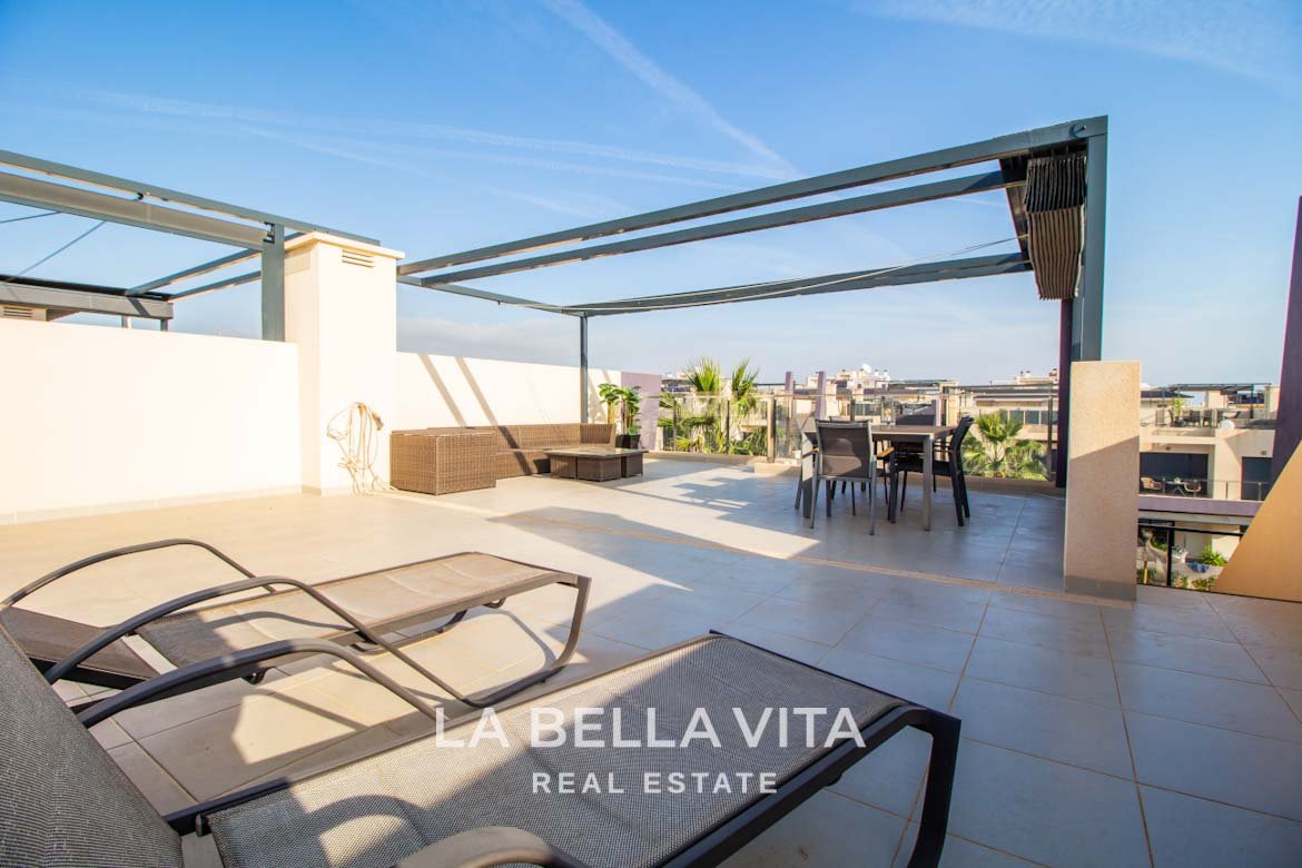 Modern Apartment with solarium for sale step away from the beach in Mil Palmeras, Alicante, Spain solarium