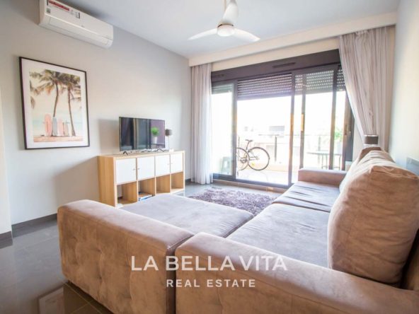 Modern Apartment with solarium for sale step away from the beach in Mil Palmeras, Alicante, Spain Living Room