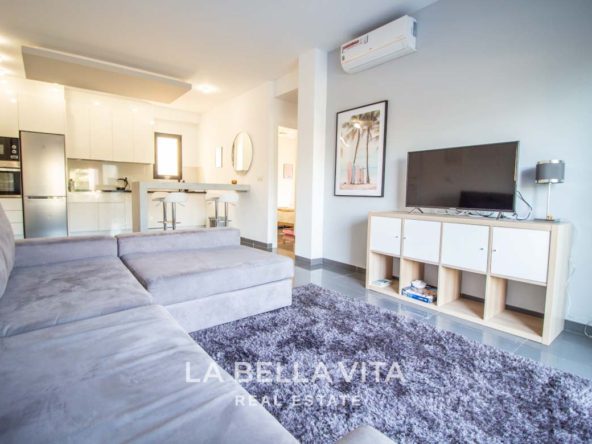 Modern Apartment with solarium for sale step away from the beach in Mil Palmeras, Alicante, Spain Living Room