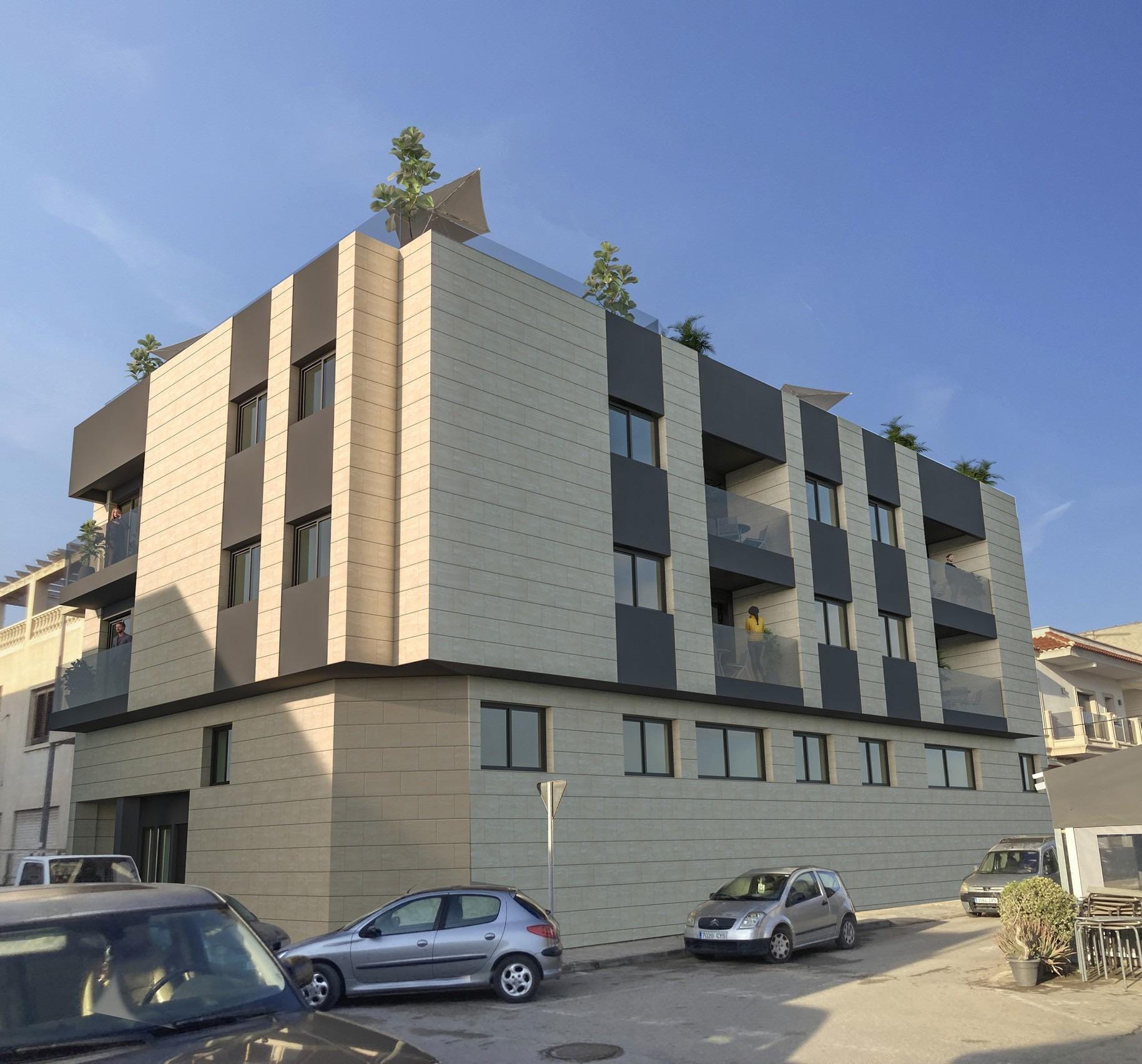 New-Build-Apartments-for-Sale-in-Catral-Alicante-with-Rooftop-Pool-1 Corner elevation of a modern apartment block with glass balconies and rooftop plants