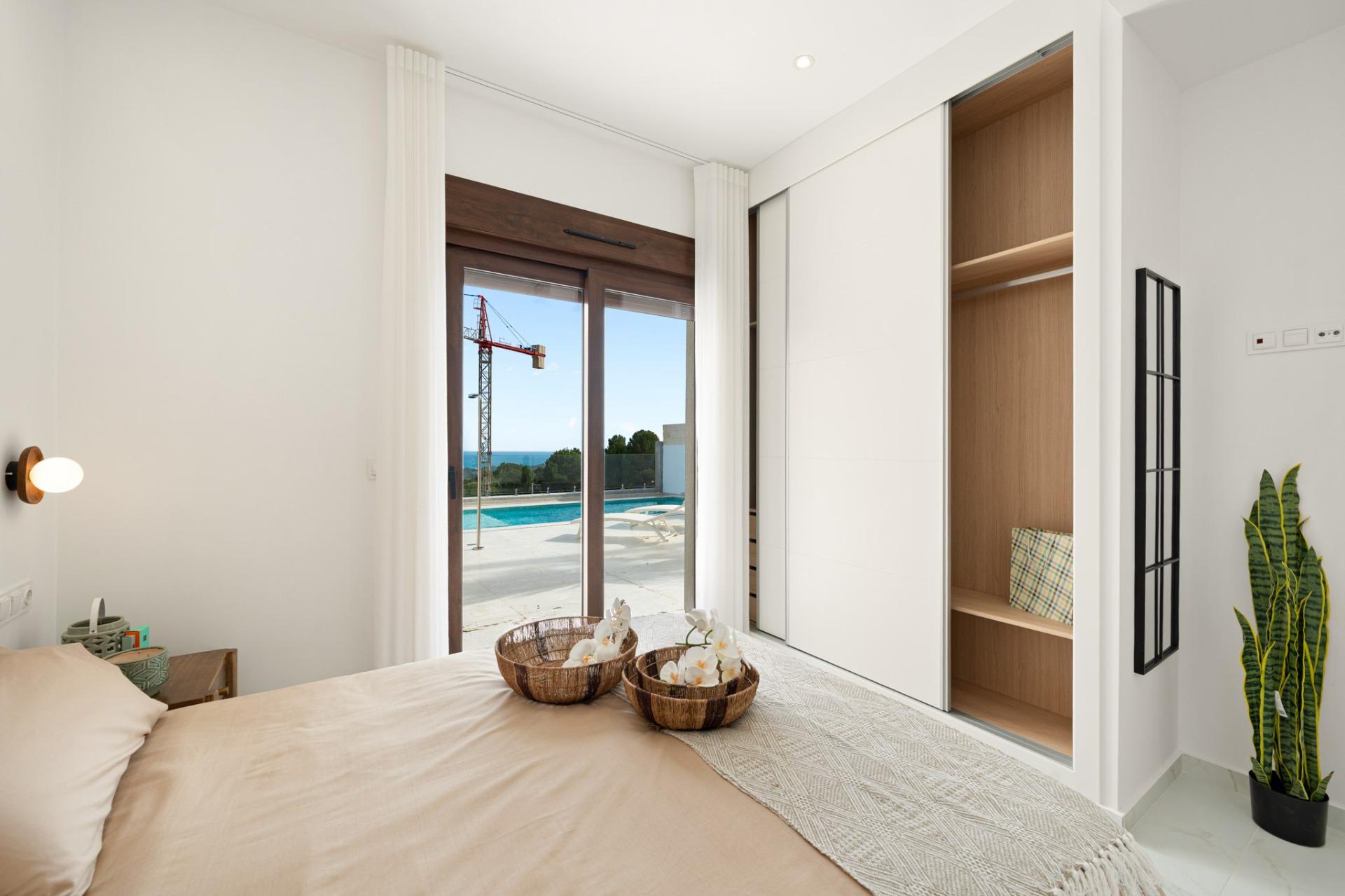 Impresionante villa de obra nueva con vistas al mar y piscina privada en venta en Polop
