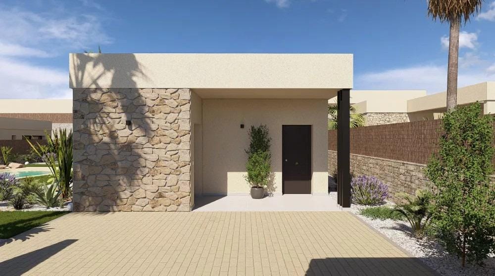 Modern single-storey 4-bedroom villa entrance with stone accents and shadows at Altaona Golf Resort, Murcia