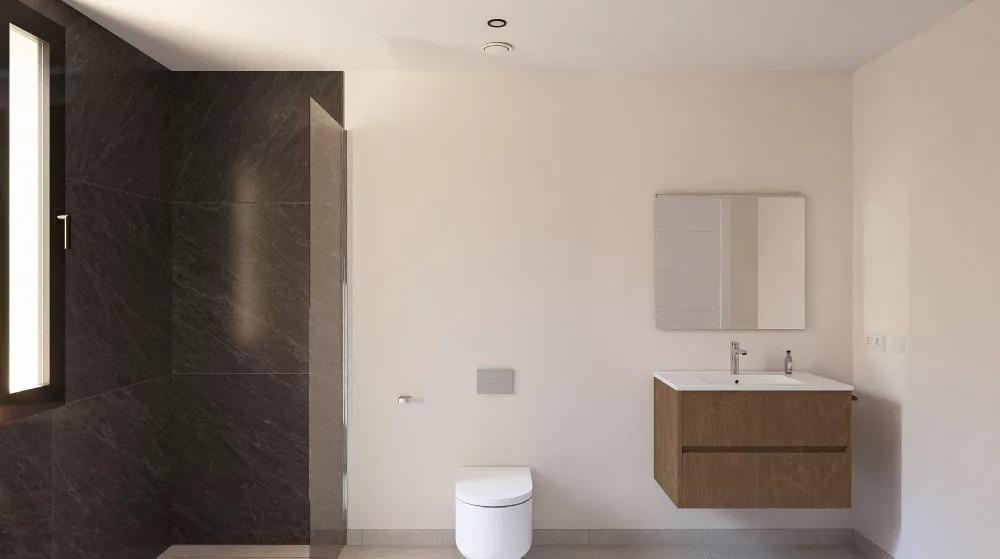 Modern bathroom with walk-in shower and floating vanity in single-storey villa at Altaona Golf Resort, Murcia.