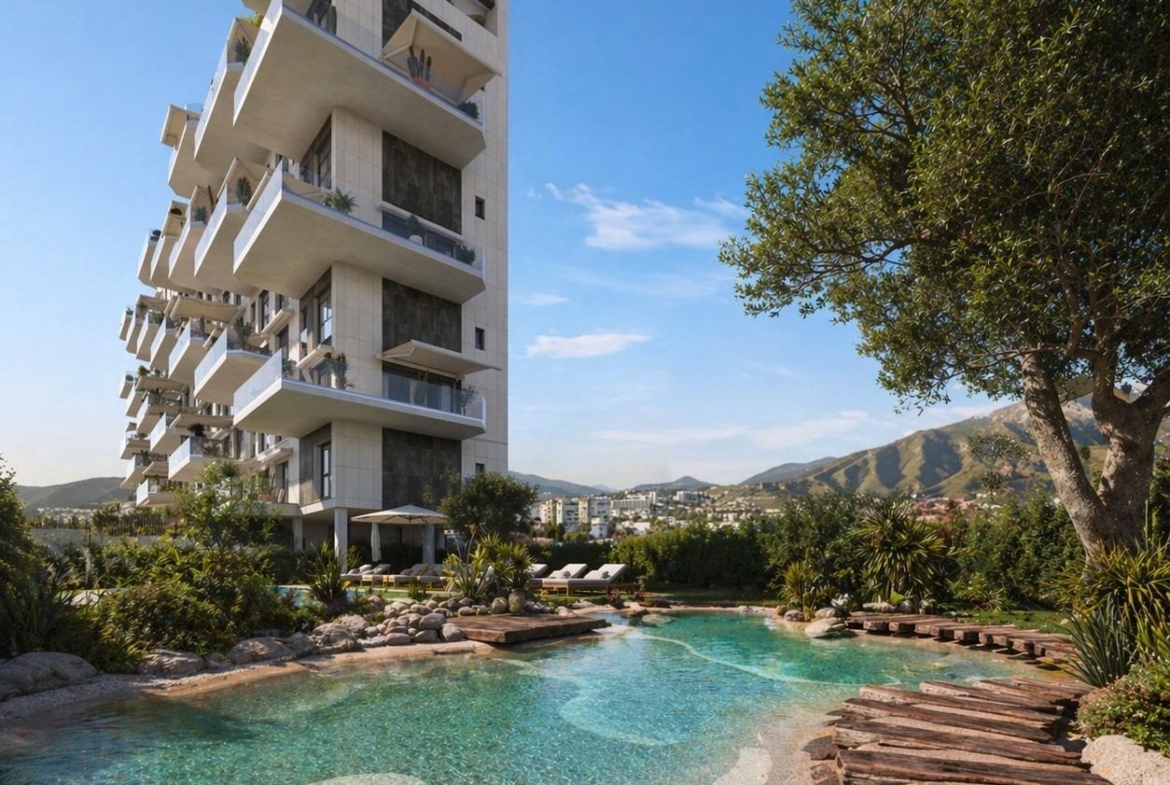 New build 2-bedroom ground floor apartment in Cala de Finestrat with garden views and a naturalistic pool setting.
