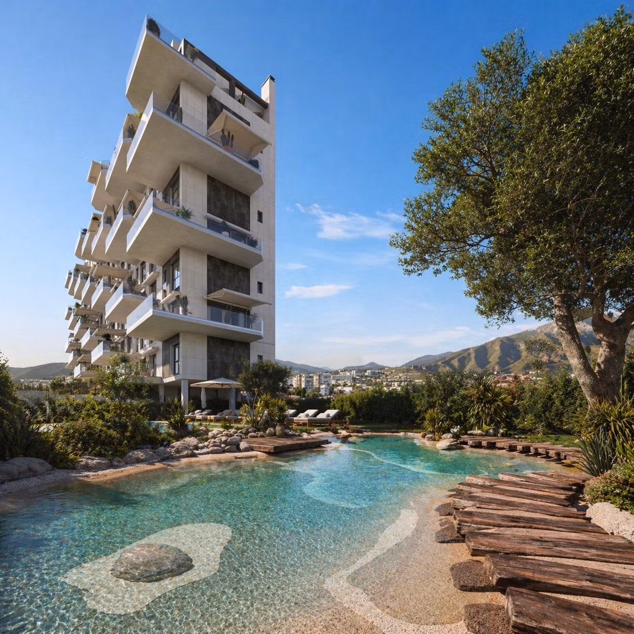 Modern new build apartment in Cala de Finestrat with large pool, natural landscaping, and mountain views.