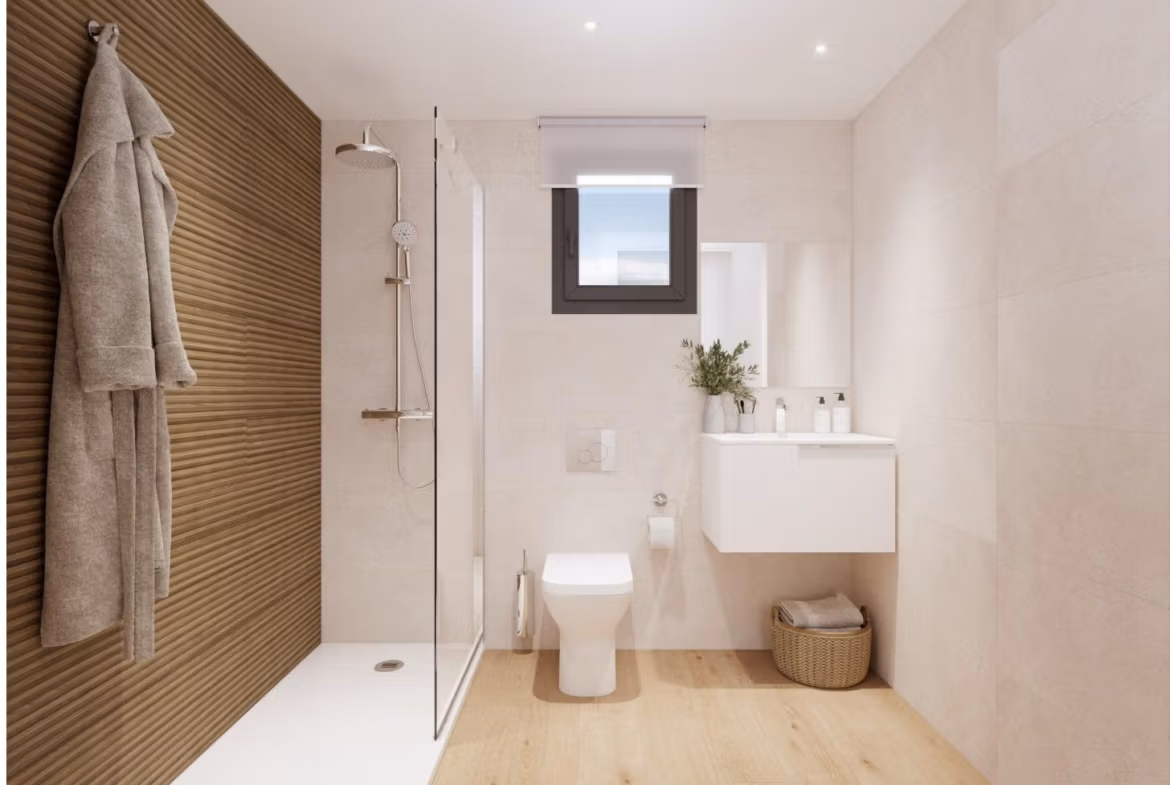Modern bathroom with walk-in shower and wood panel wall in elevated new build 2 bedroom penthouse in Cala de Finestrat