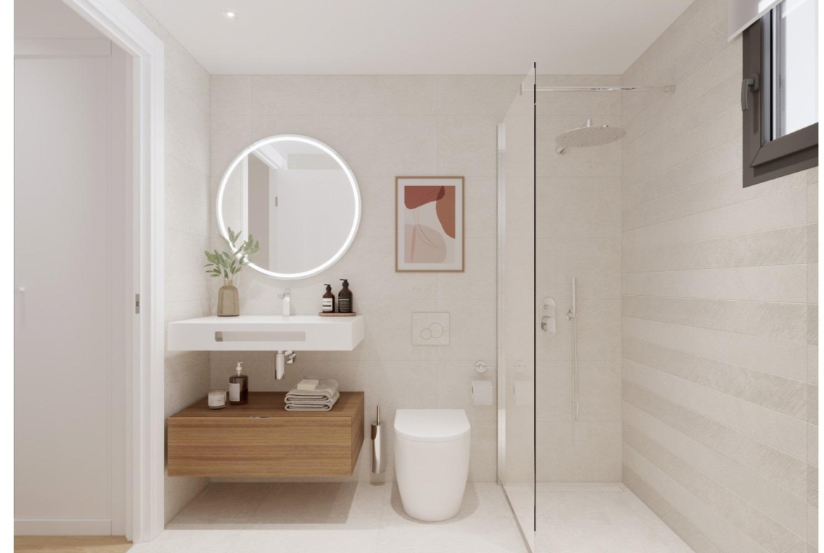 Modern bathroom with walk-in shower and floating vanity in a 2 bedroom ground floor apartment in Cala de Finestrat.