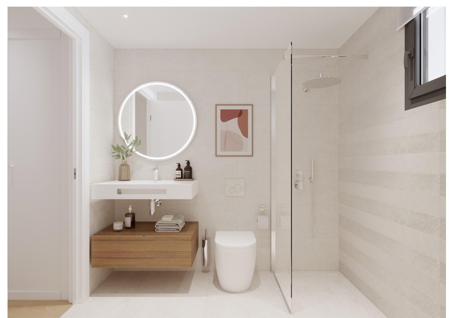 Modern bathroom with walk-in shower and floating vanity in a 2 bedroom ground floor apartment in Cala de Finestrat.