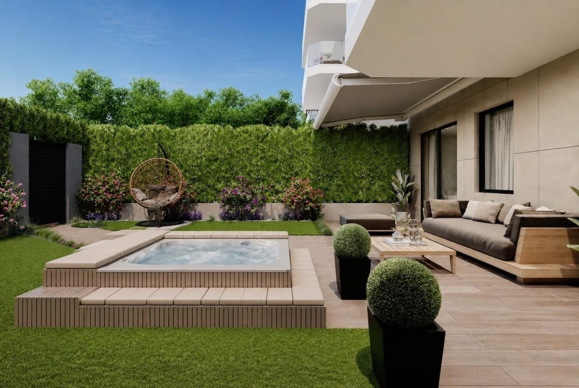Outdoor terrace with jacuzzi and seating area at a smart new build 1 bedroom apartment in Cala de Finestrat