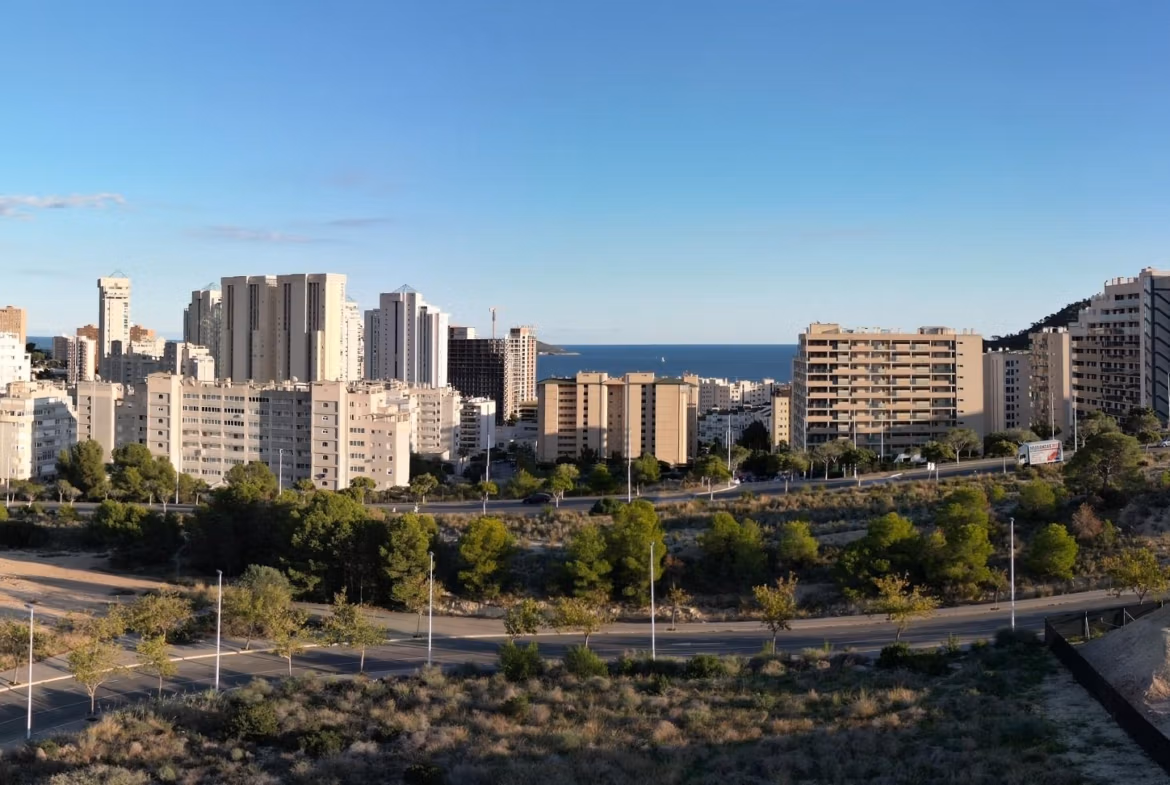 Sea view and surrounding buildings from the elevated solarium of a new build 2 bedroom penthouse in Cala de Finestrat.