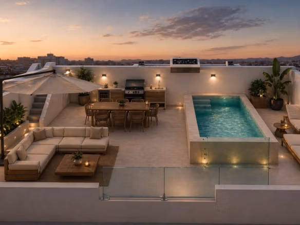 Rooftop solarium with pool, outdoor dining, and lounge area in premium 3 bedroom penthouse in Cala de Finestrat.