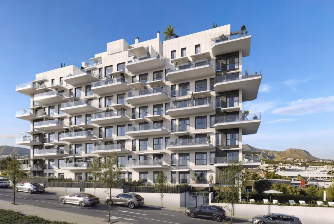 Modern elevated 2-bedroom penthouse building with balconies and mountain views in Cala de Finestrat.