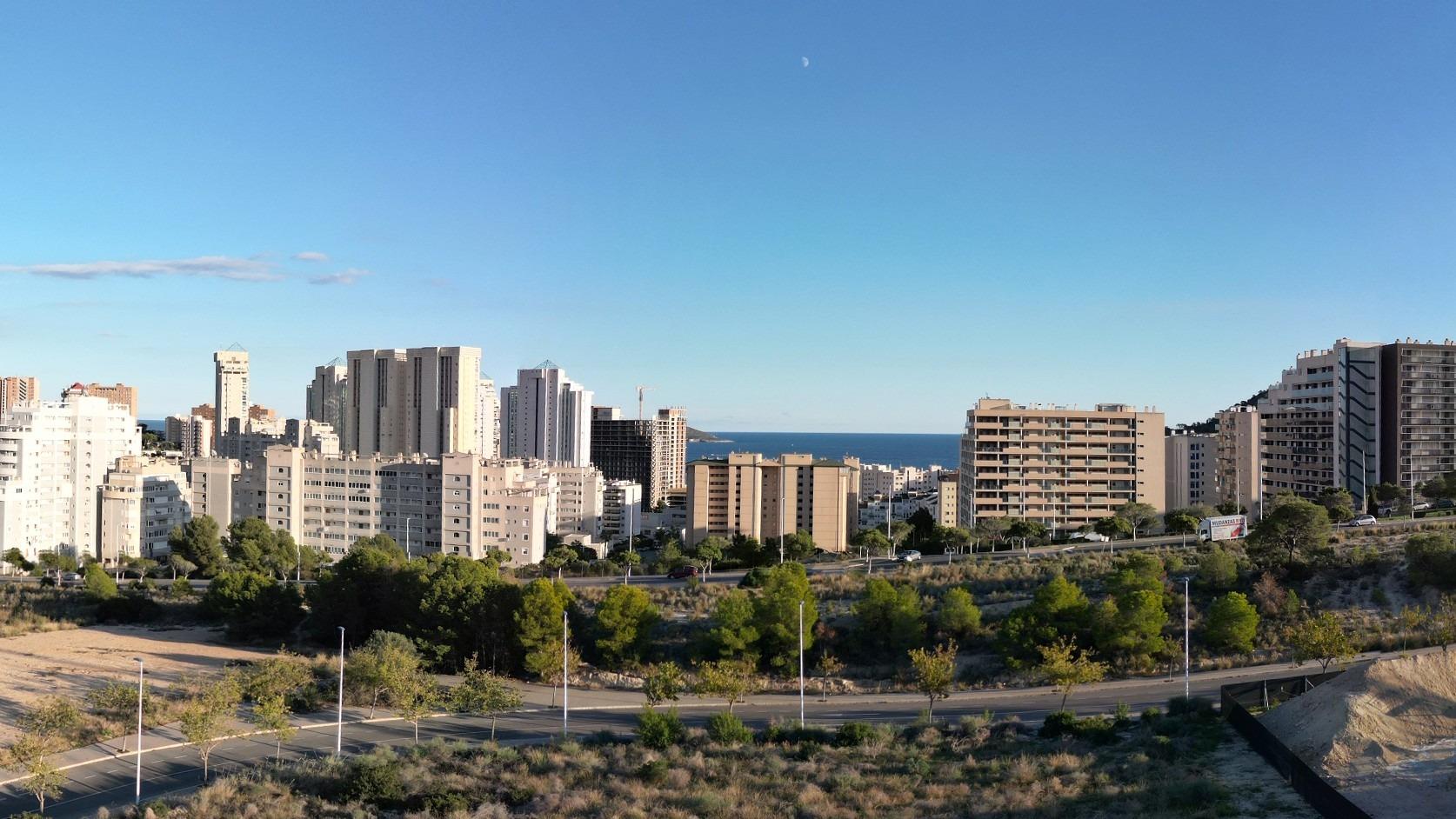 View of urban buildings and sea from a smart new build 1 bedroom apartment in Cala de Finestrat.