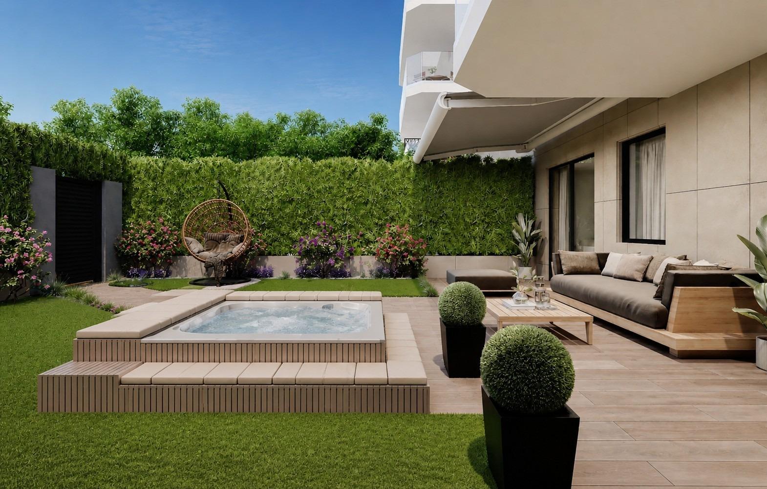 Garden terrace with seating and jacuzzi in a 2-bedroom ground floor apartment in Cala de Finestrat.