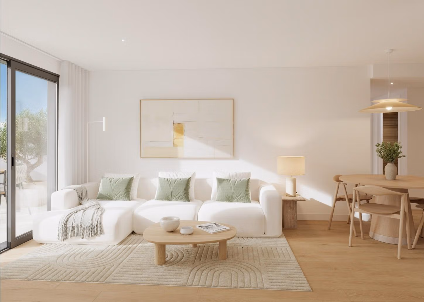 Luxury-New-Build-Apartments-in-Cala-Finestrat-Close-to-the-Beach-7 Bright living room with white sofa and dining area in a new 2-bedroom penthouse in Cala de Finestrat.
