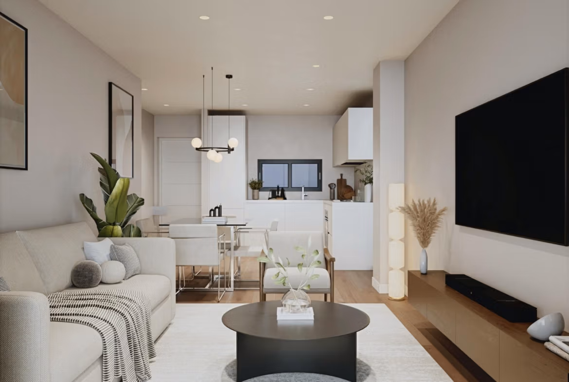Modern living room with neutral decor in elevated 2-bedroom penthouse in Cala de Finestrat new build.