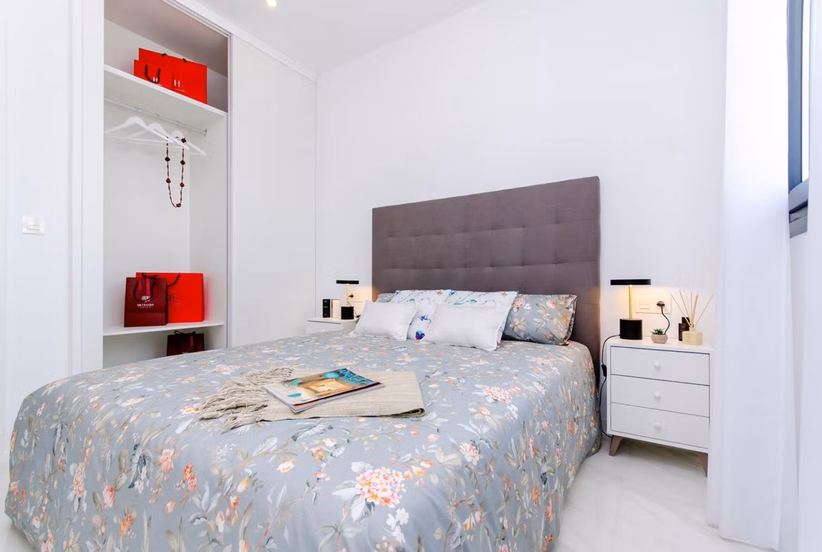 Luxury-New-Build-Semi-Detached-Villas-at-Vistabella-Golf-Resort-21 Bedroom with double bed, built-in wardrobe, and modern decor in a new build semi-detached villa at Vistabella Golf Resort