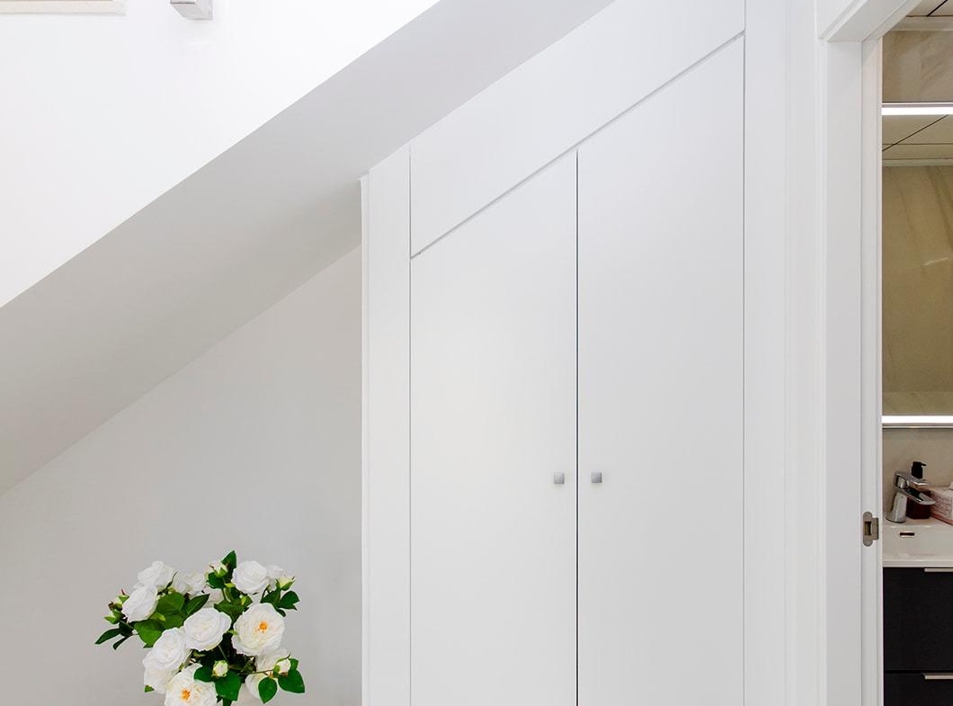 Built-in storage under staircase inside the semi-detached villa at Vistabella Golf Resort new build property