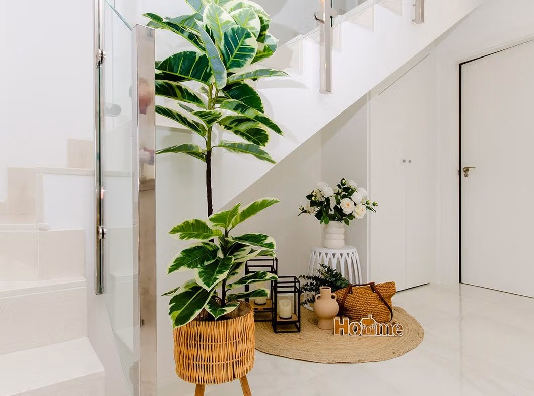 Luxury-New-Build-Semi-Detached-Villas-at-Vistabella-Golf-Resort-44 Bright modern hallway with stairs and decorative plants inside a new build semi-detached villa in Vistabella Golf Resort