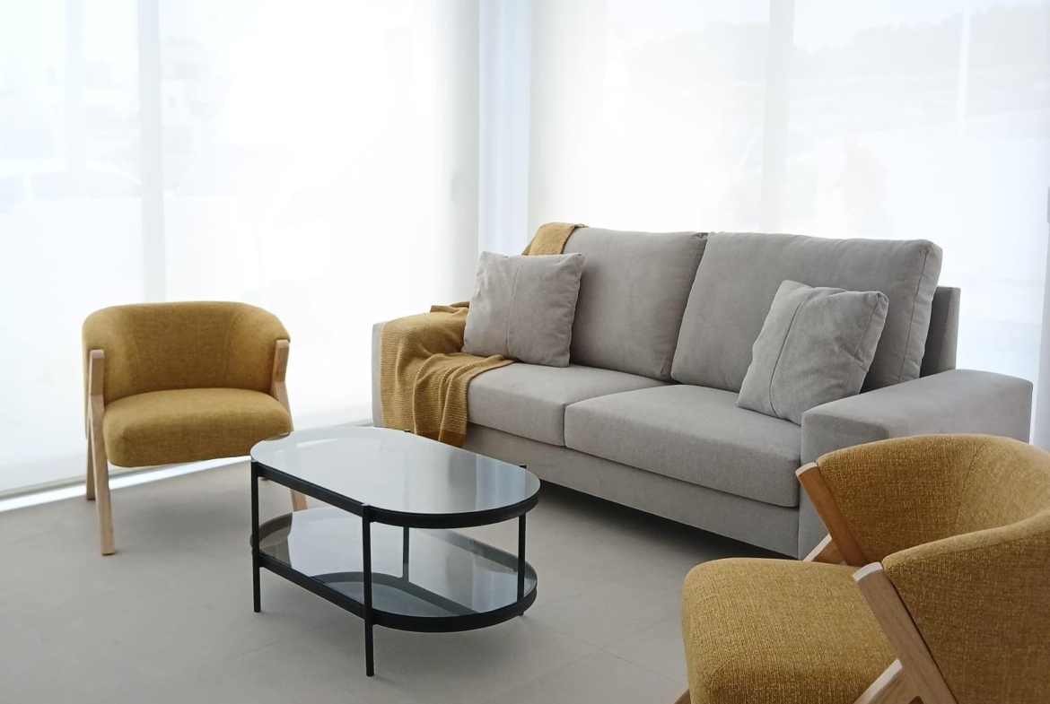 Bright living room with modern furniture in a new build quad property in Bigastro, Alicante