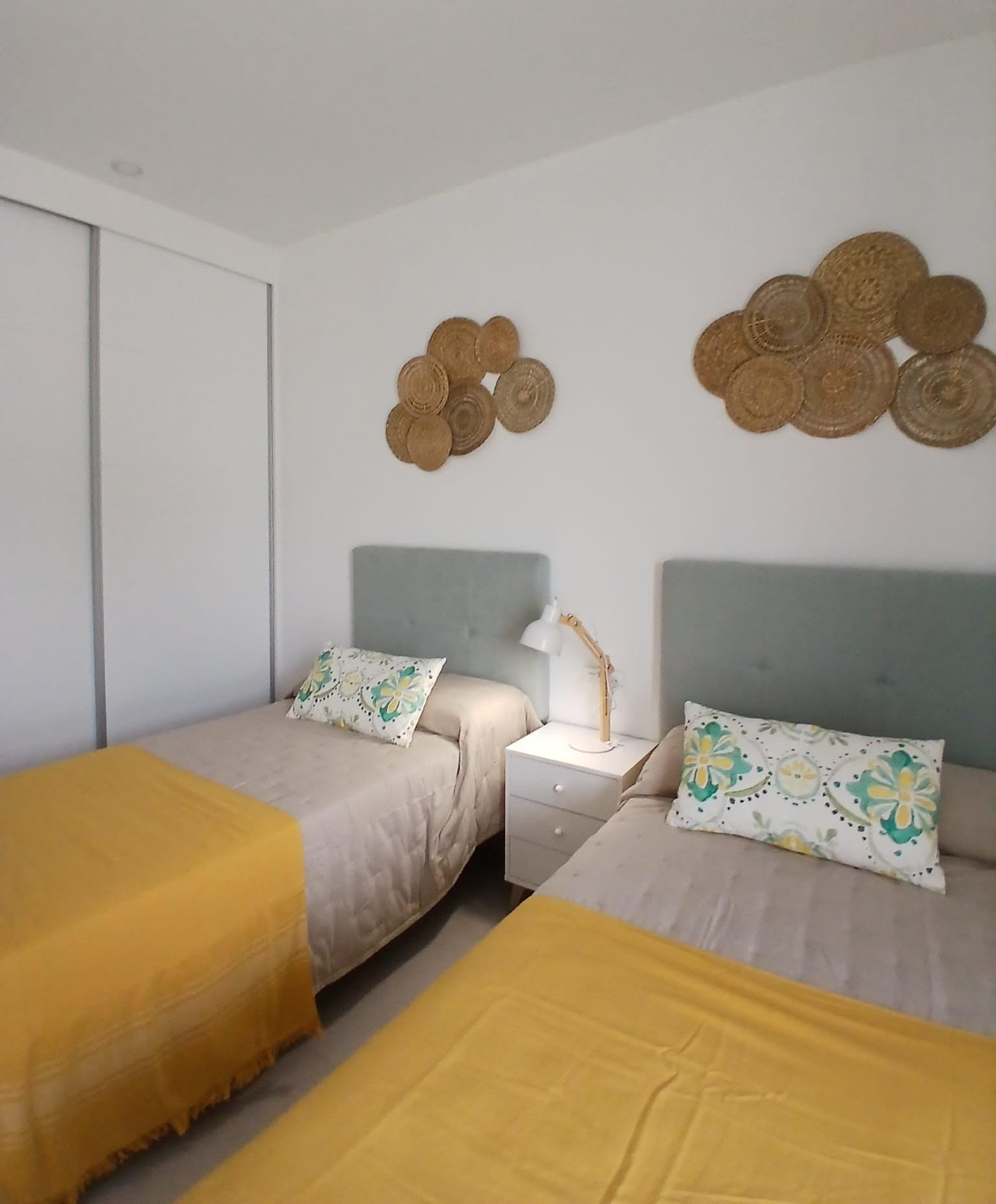 Modern-New-Build-Quad-Villas-in-Bigastro-Alicante-12 Twin bedroom with yellow bedding in modern new build quad property in Bigastro, Alicante