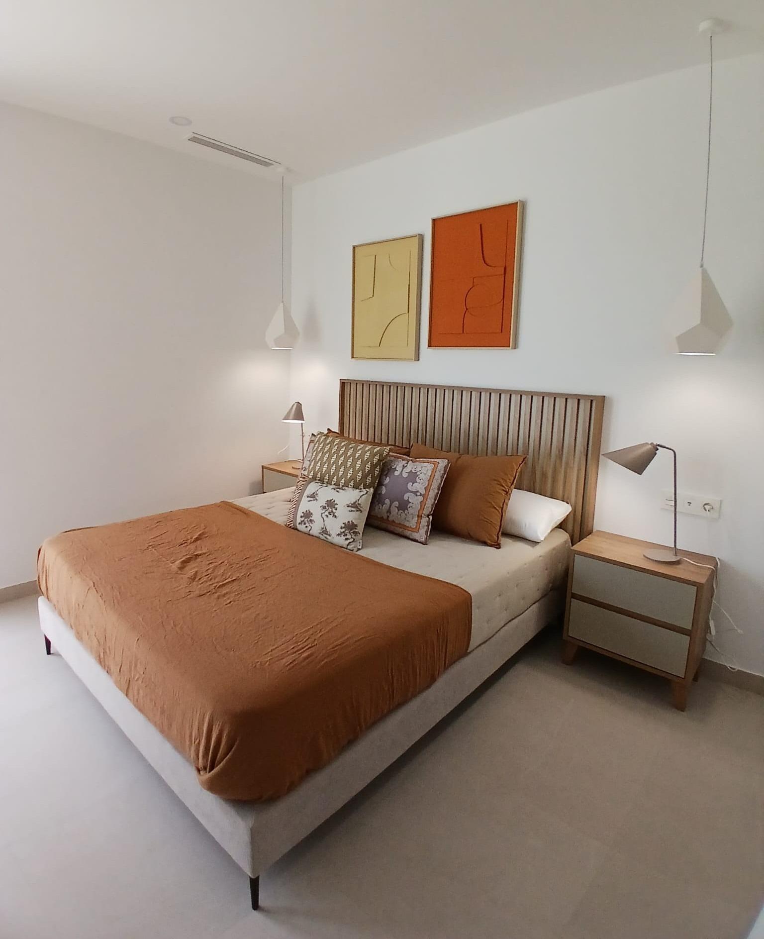 Modern-New-Build-Quad-Villas-in-Bigastro-Alicante-6 Bright bedroom with modern double bed and bedside tables in versatile new build quad property in Bigastro, Alicante