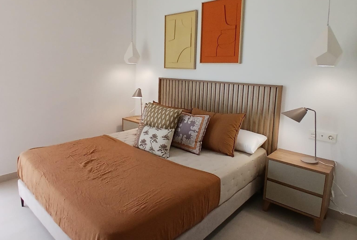 Spacious bedroom with modern decor in a new build quad villa with basement for sale in Bigastro, Alicante
