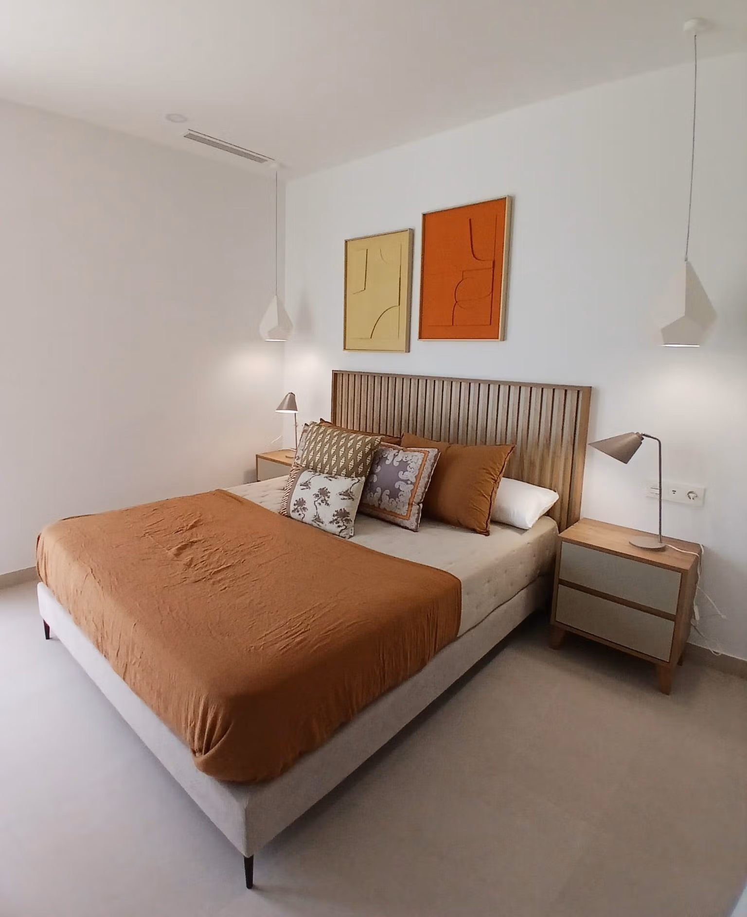 Spacious bedroom with modern decor in a new build quad villa with basement for sale in Bigastro, Alicante