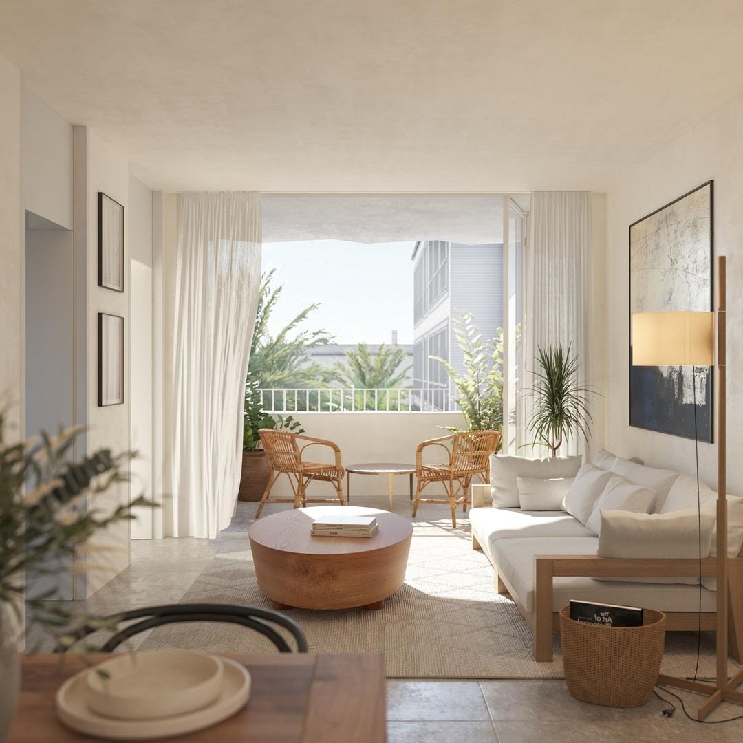 NEW-BUILD-APARTMENTS-AND-PENTHOUSES-NEAR-THE-BEACH-IN-TORREVIEJA-1 Bright living room with balcony seating in a 1-bedroom penthouse near the beach in Torrevieja.