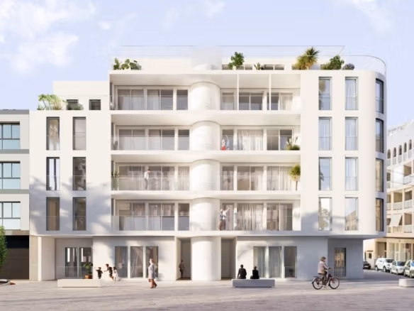 Modern white exterior of a sunlit new build 1 bedroom penthouse near the beach in Torrevieja with balconies and rooftop terrace.