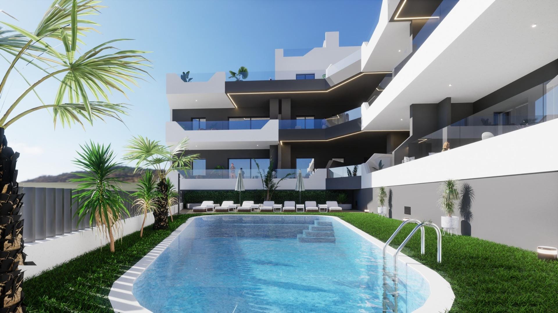 Outdoor pool and terrace area of a new build 3 bedroom penthouse in Benijofar with modern architecture and greenery.