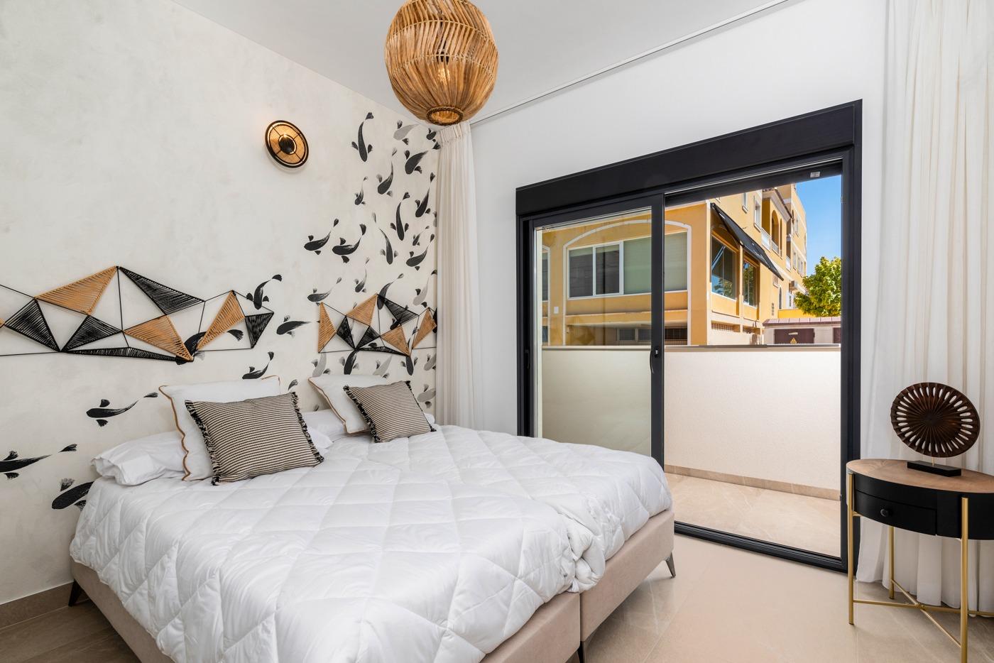 Bright bedroom with balcony in a new build 2 bedroom ground floor apartment in Benijofar