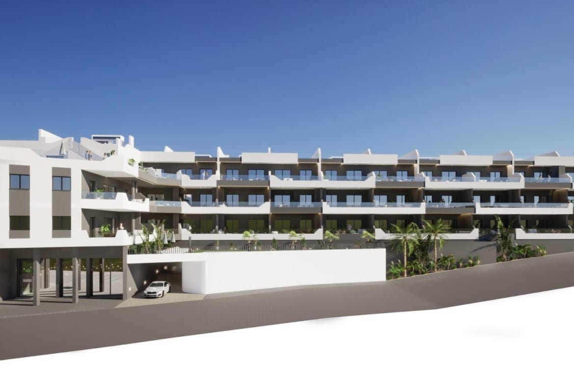 Modern three-story apartment building with balconies and parking, new build 3 bedroom ground floor apartment for sale in Benijofar.