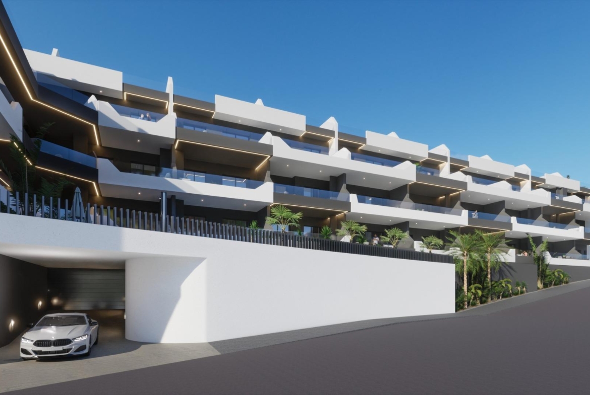 Modern exterior view of a new build 2 bedroom ground floor apartment complex in Benijofar with parking spaces.