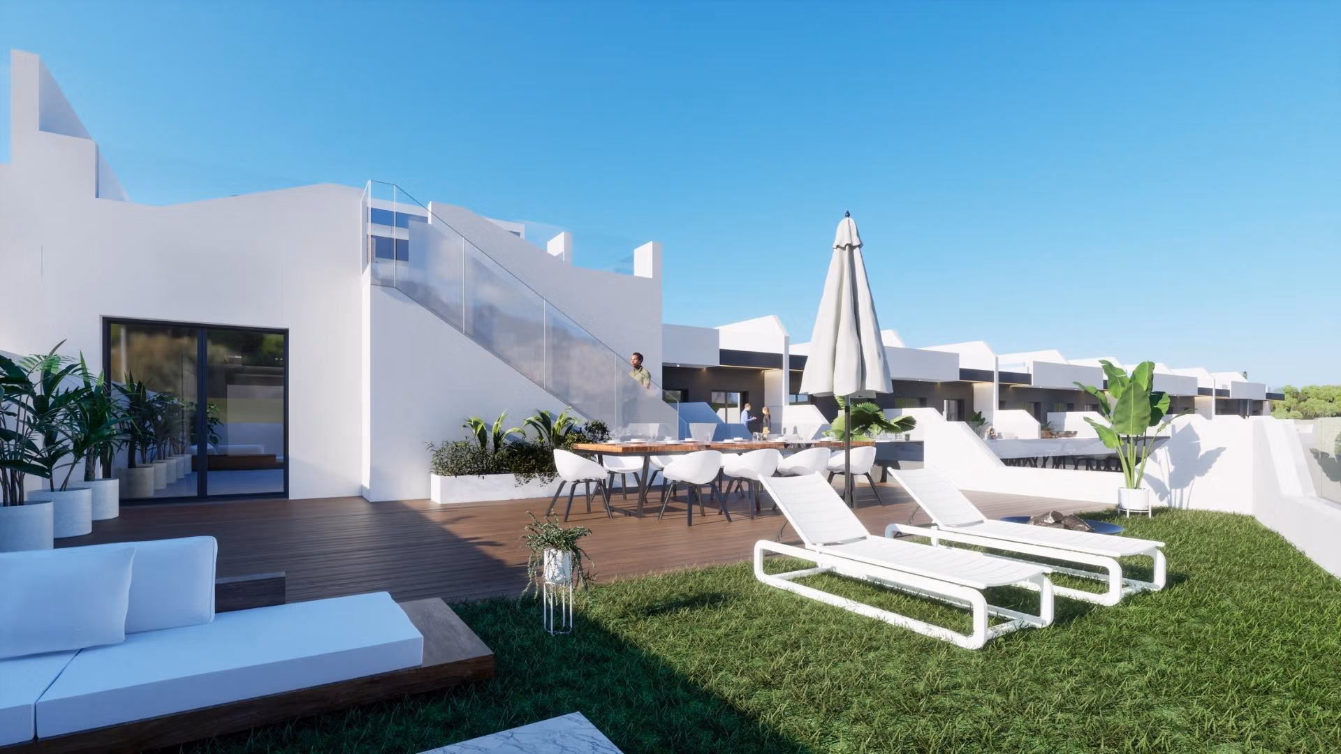 Sunlit rooftop terrace with seating and loungers at bright new build 2 bedroom apartment in Benijofar, Alicante