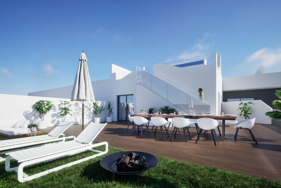 Rooftop terrace with outdoor dining area and sun loungers at spacious new build 4 bedroom apartment in Benijofar, Alicante