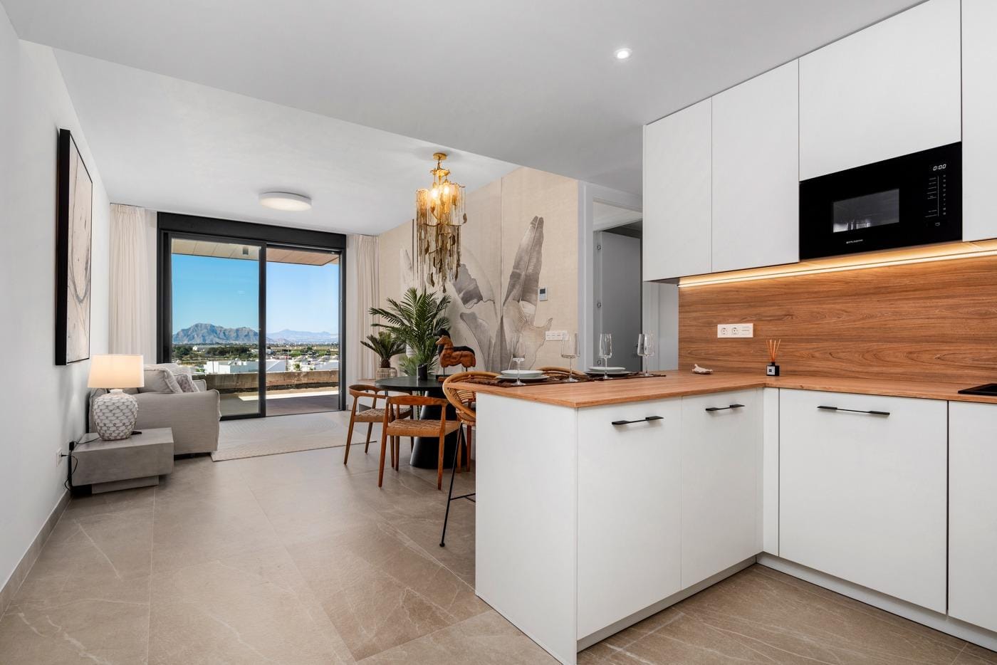 NEW-BUILD-BUILD-RESIDENTIAL-COMPLEX-IN-BENIJOFAR-3 Modern kitchen and dining area in a new build 4 bedroom ground floor apartment in Benijofar with terrace and mountain views