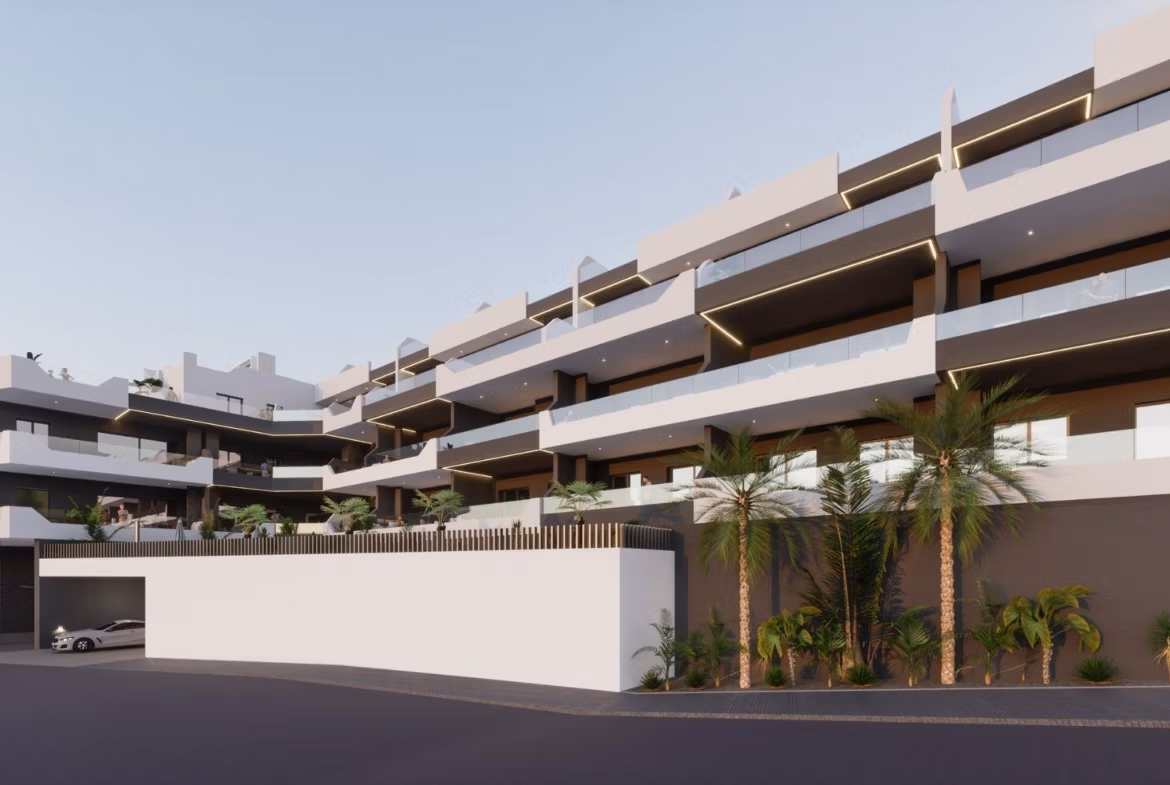 Modern new build 3 bedroom apartment exterior with balconies and palm trees in Benijofar, Costa Blanca South.