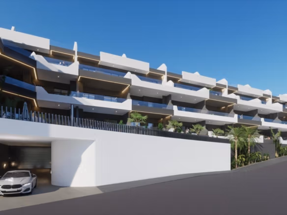 Modern white exterior of Neubau 2 Schlafzimmer Apartment complex in Benijofar, Alicante mit balconies und underground parking.