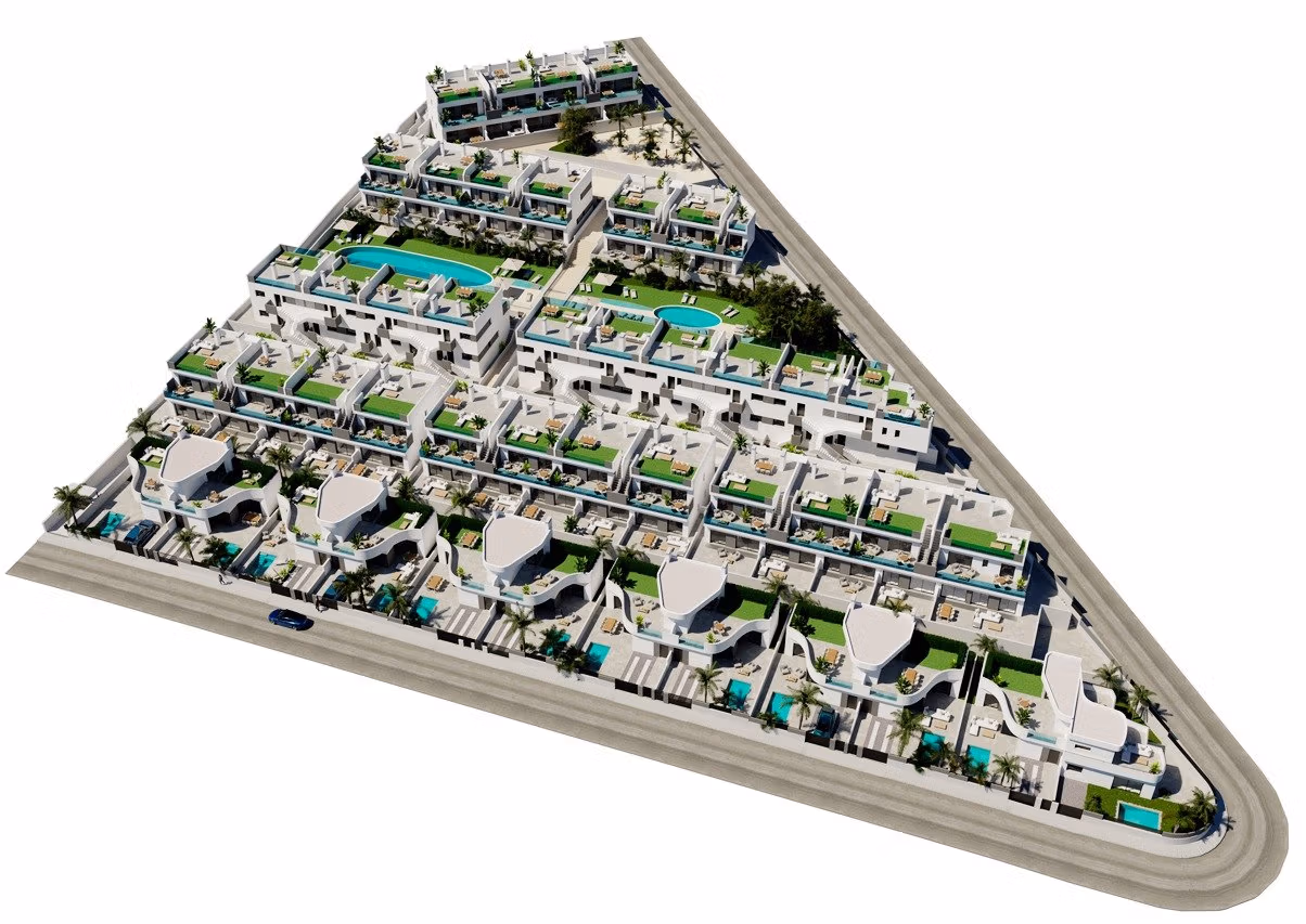 NEW-BUILD-RESIDENCIAL-IN-LOS-BALCONES-TORREVIEJA-10 Aerial view of modern top floor apartments with solariums, pools, and green terraces in Los Balcones, Torrevieja.