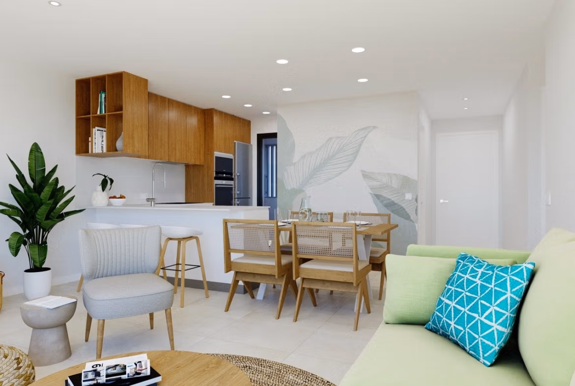 NEW-BUILD-RESIDENCIAL-IN-LOS-BALCONES-TORREVIEJA-3 Open plan living and dining area with modern kitchen in a top floor apartment in Los Balcones, Torrevieja.