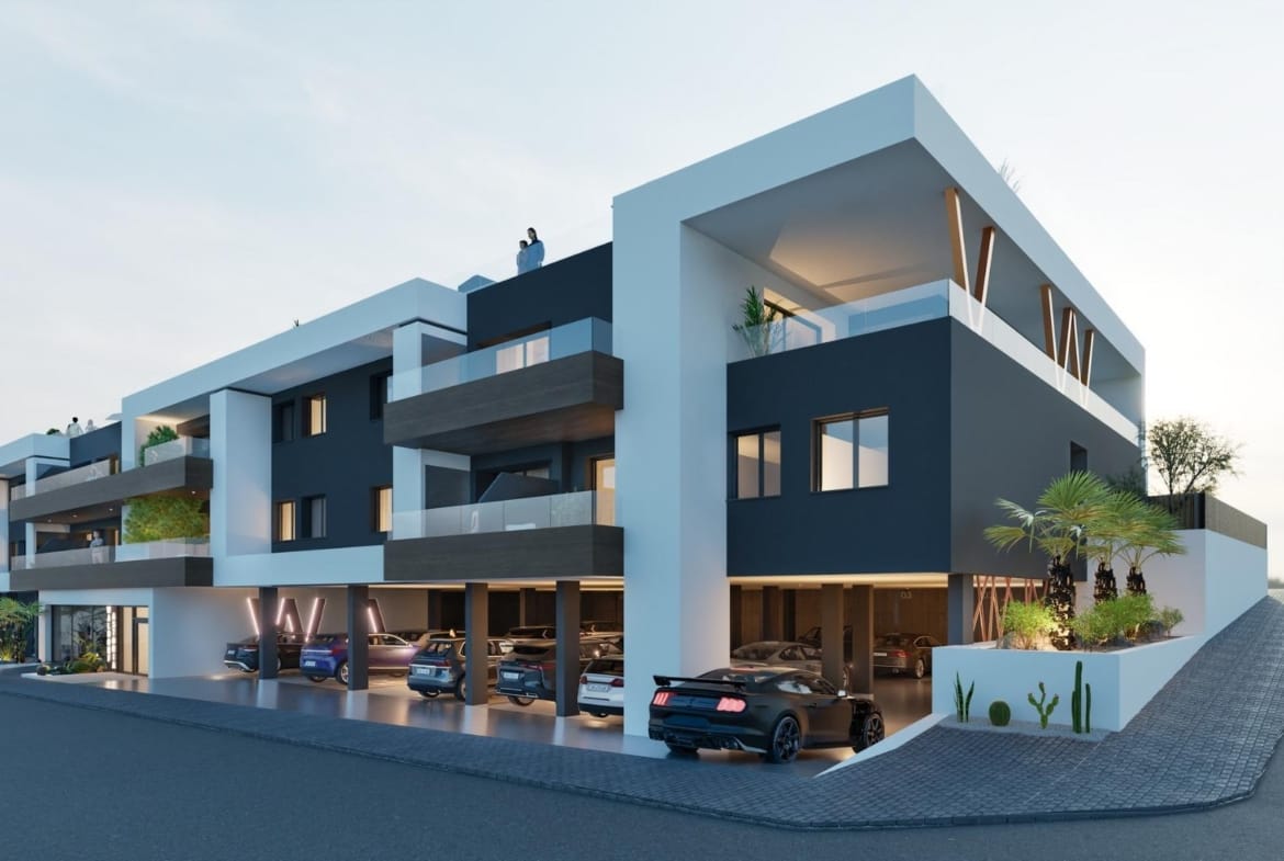 Modern exterior view of a new build 2 bedroom ground floor apartment in Benijofar with covered parking and balconies.