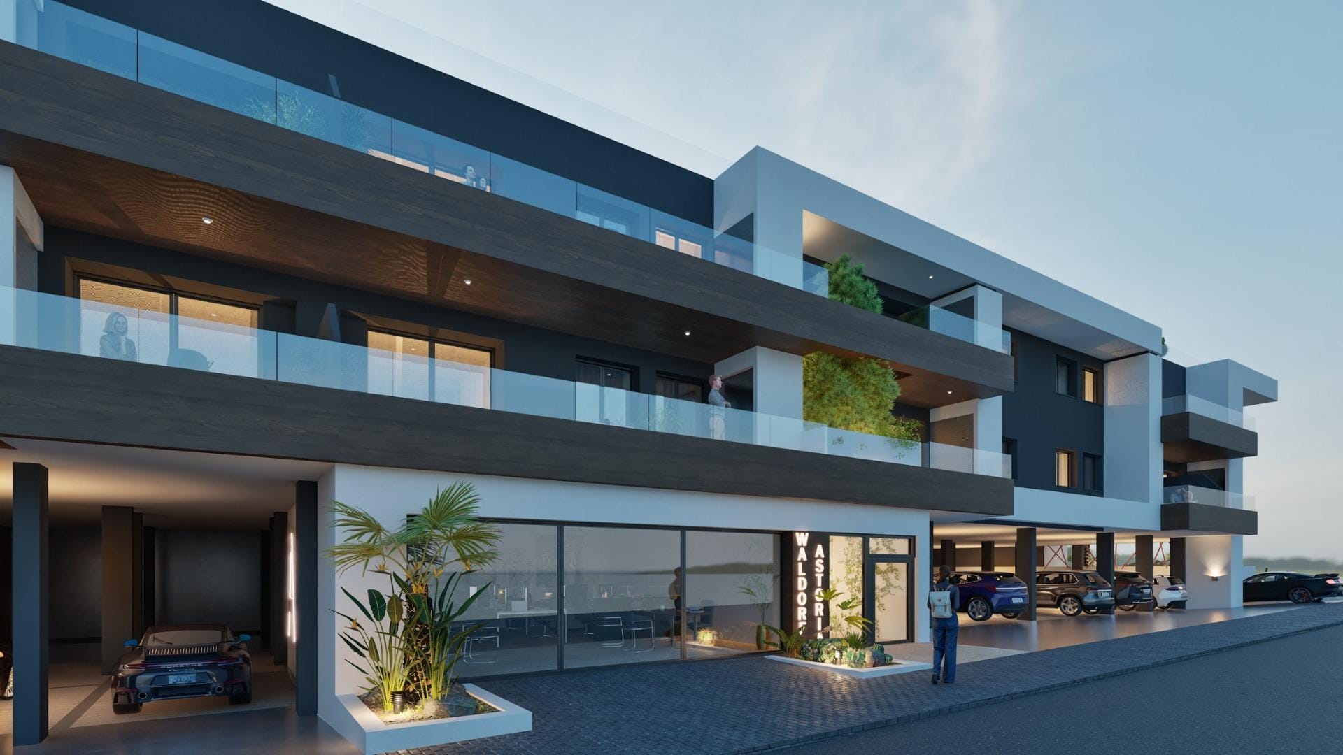 Modern exterior of elevated new build 2 bedroom top floor apartment with balconies in Benijofar at dusk