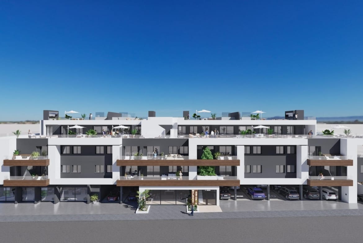 Modern three-story apartment building with balconies and parking, new 3 bedroom apartment for sale in Benijofar.