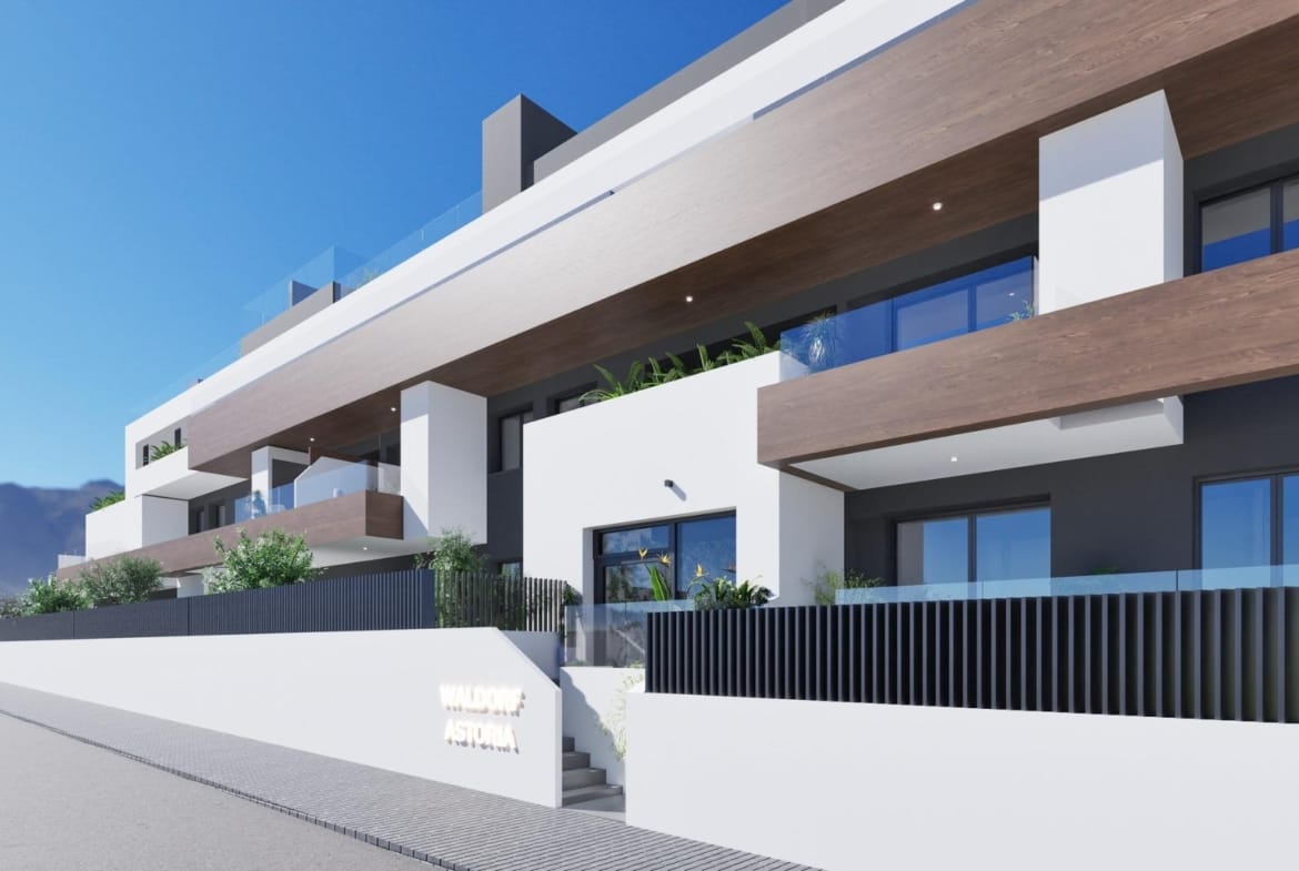Modern exterior of a new build 2 bedroom apartment in Benijofar, Alicante with balconies and mountain views.