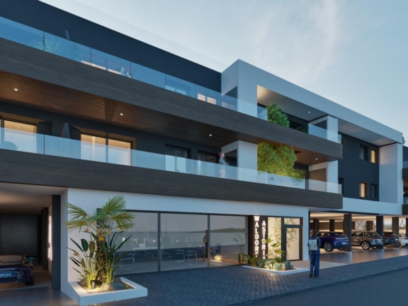 Modern exterior of a new build ground floor 2 bedroom apartment with covered parking in Benijofar at dusk.