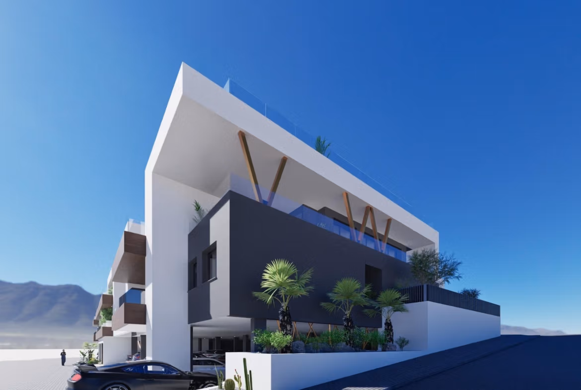 NEW-BUILD-RESIDENTIAL-IN-BENIJOFAR-6 Modern elevated new build 2 bedroom top floor apartment with solarium and parking in Benijofar under clear blue sky