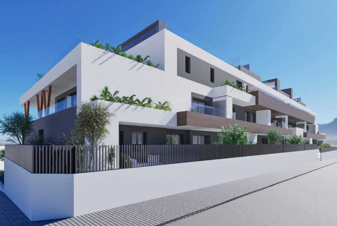 Modern elevated 2 bedroom top floor apartment building with terraces and greenery in Benijofar.