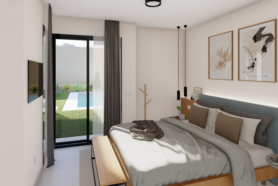 Bedroom with large bed and sliding glass door overlooking private pool in single-storey villa at Altaona Golf Resort